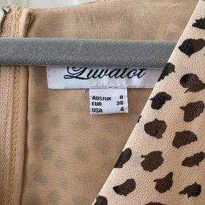 Pink polka-dotted zip-up top!